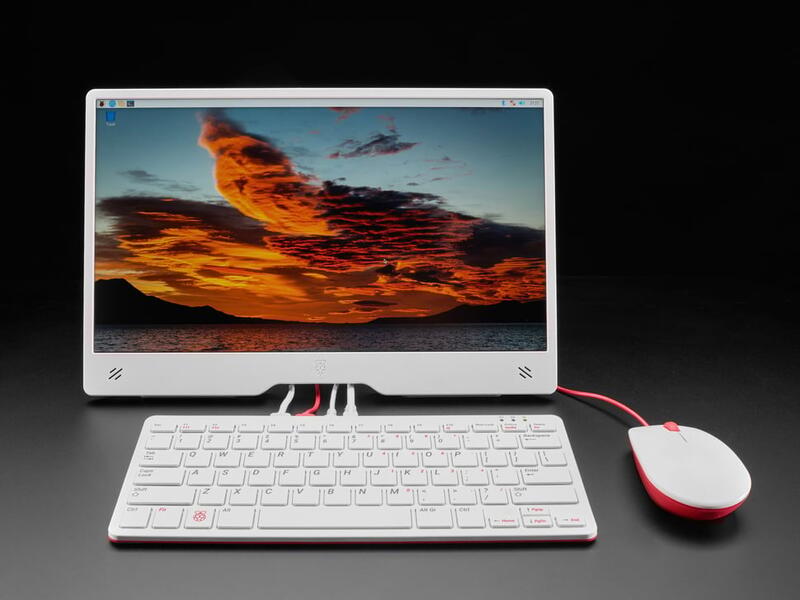 Raspberry Pi 500+ Desktop Kit with monitor, keyboard, and mouse